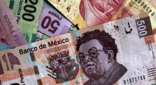 Monedas de A. Latina operan con pérdidas mientras los mercados esperan el comunicado de la Fed
